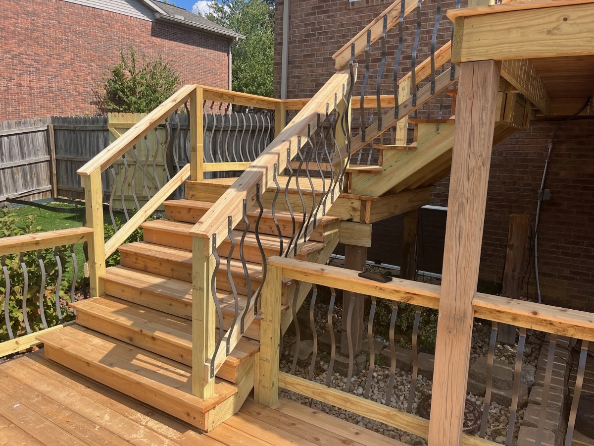 Two-story deck stairway with decorative balusters