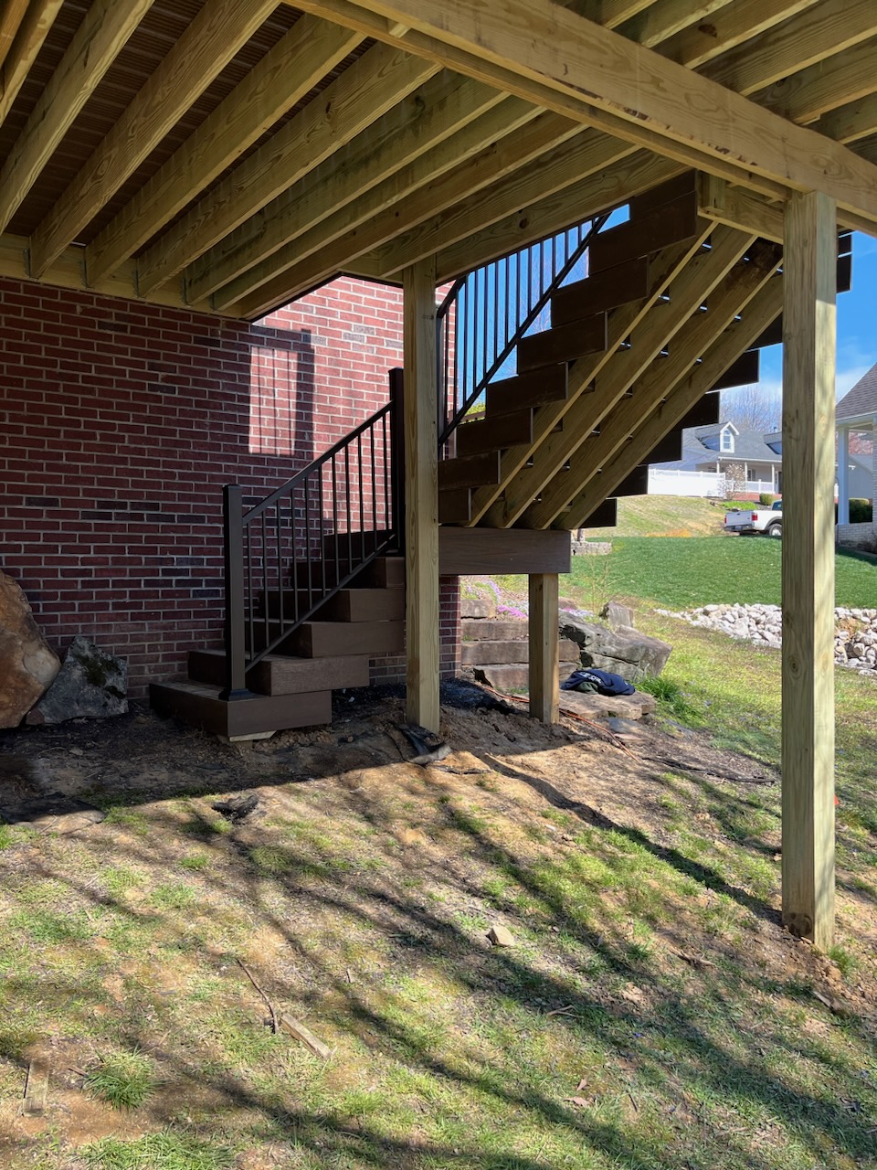 Stair framing underneath a raised deck