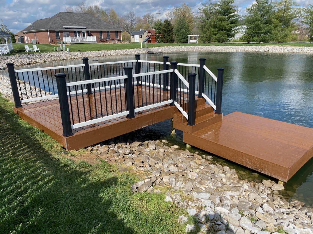Composite pond dock with railing
